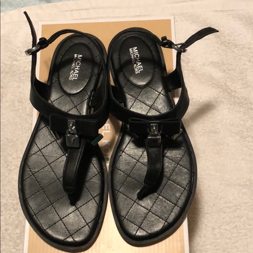 Michael Kors leather sandals.